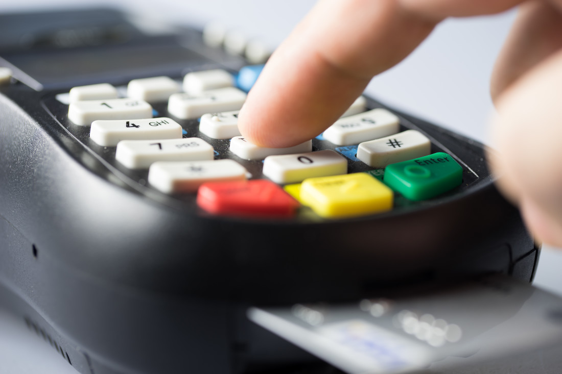 Person paying an pin machine